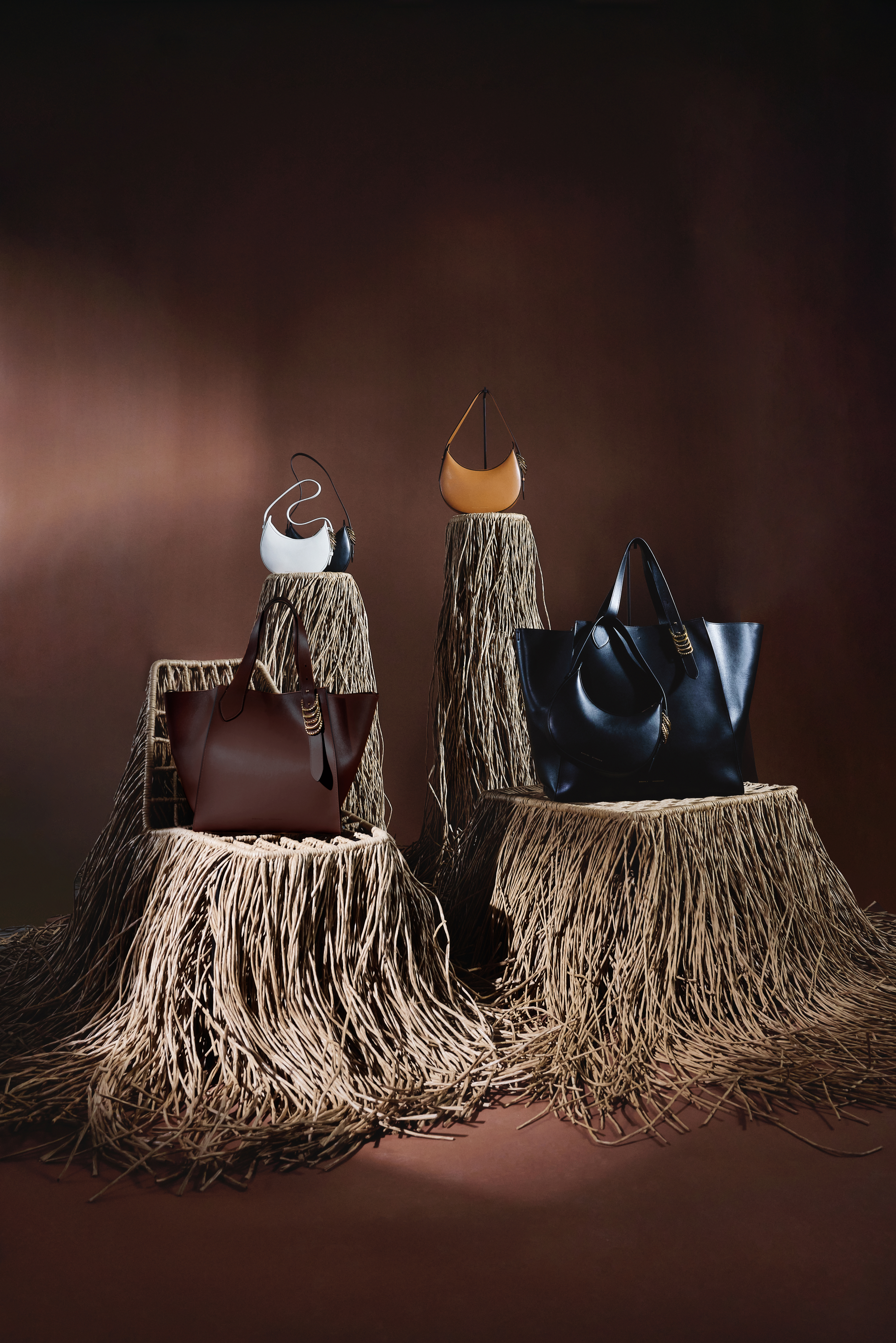leather bags on a strawy chair and tabels