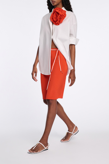Dorothee Schumacher Silk skirt with XL flower brooch orange