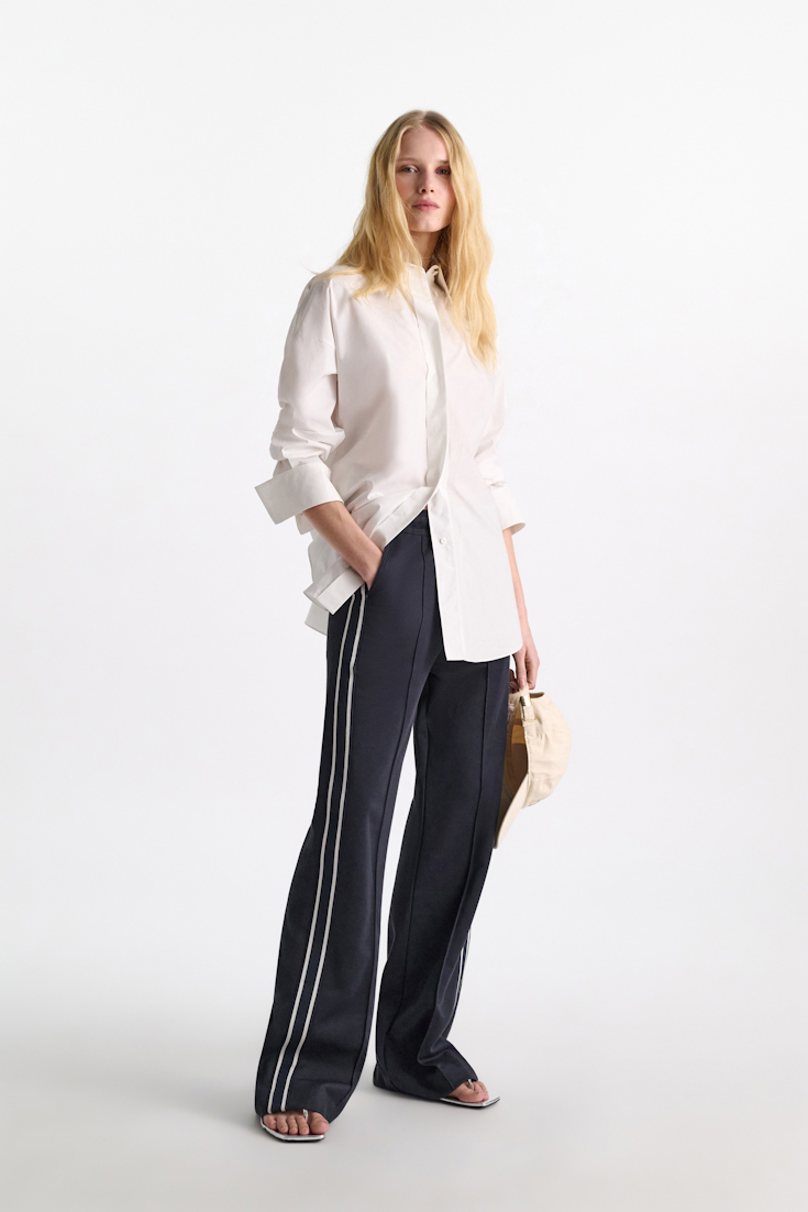 Dorothee Schumacher Track pants with knit side stripes dark navy