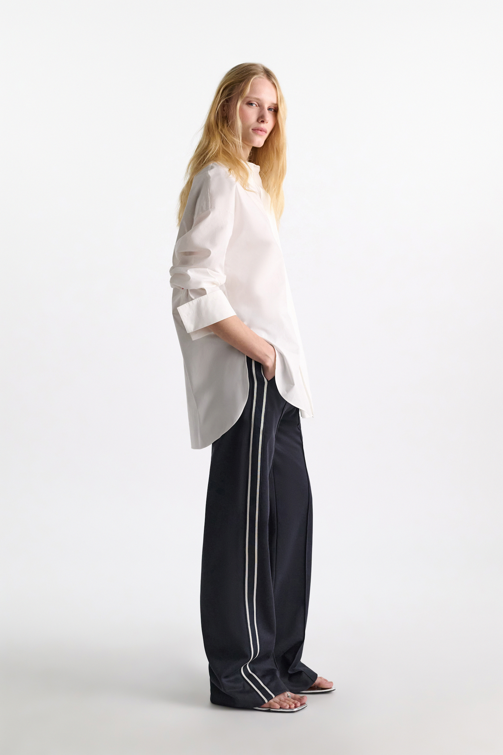Dorothee Schumacher Track pants with knit side stripes dark navy