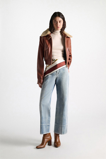 Dorothee Schumacher Sleeveless turtleneck in extra fine Merino camellia white Model Front View
