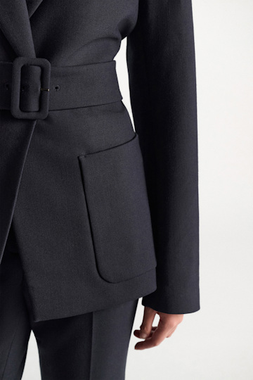 Dorothee Schumacher Belted blazer in virgin wool blend midnight navy Model Detail View