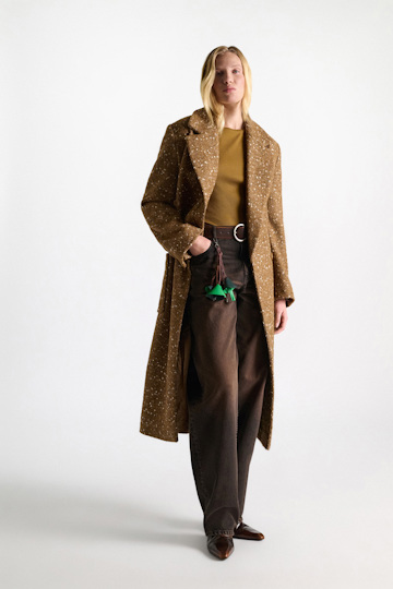 Dorothee Schumacher Handmade leather mushroom styling accessory green brown patch Model Front View