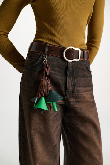 Dorothee Schumacher Handmade leather mushroom styling accessory green brown patch Model Detail View