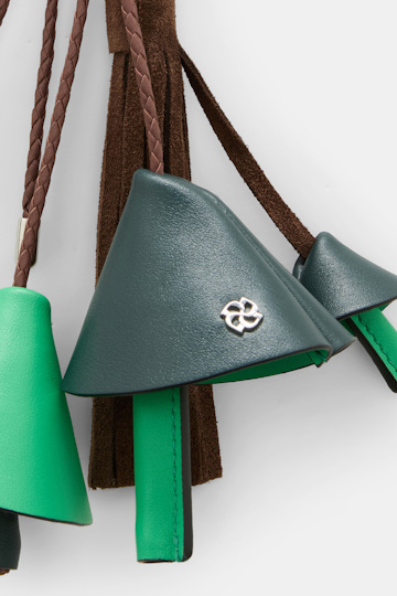 Dorothee Schumacher Handmade leather mushroom styling accessory green brown patch Product Detail View