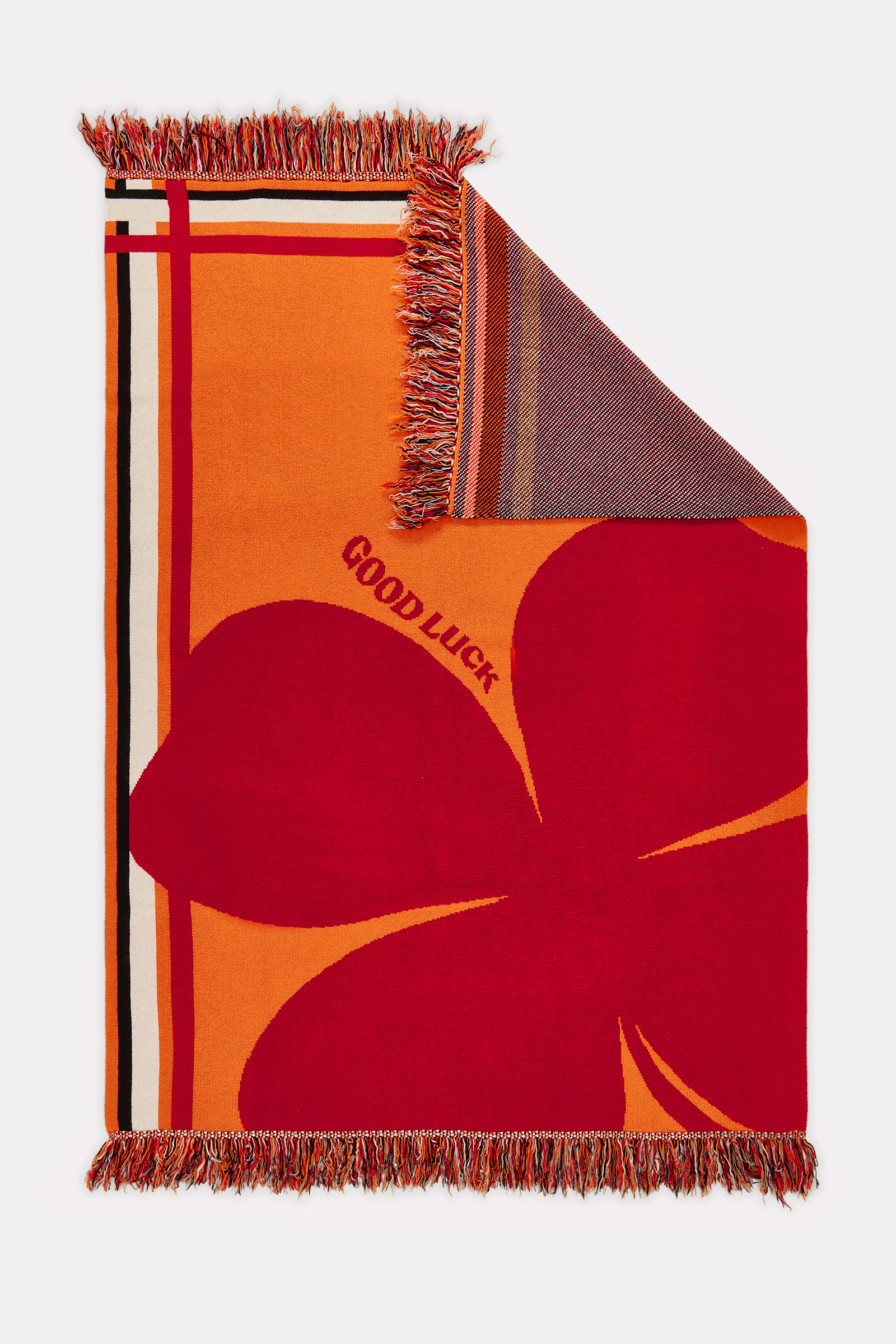 LUCKY CLOVER blanket Dorothee Schumacher Wolldecke mit Kleeblatt und GOOD LUCK Motiv orange verde militar mix