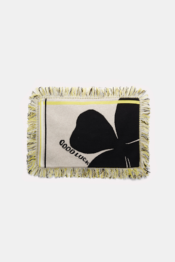 Dorothee Schumacher Kissen aus Wolle mit Kleeblatt und GOOD LUCK Motiv beige/black/yellow