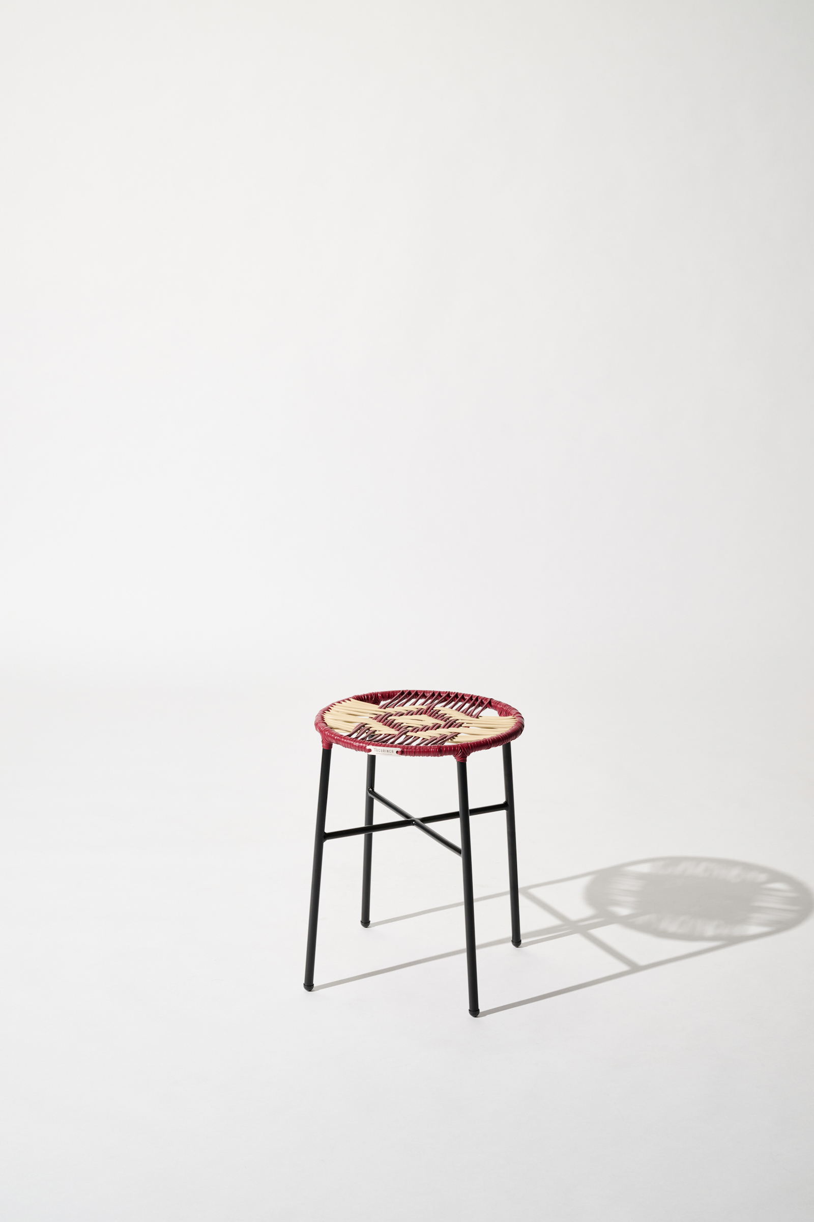 Dorothee Schumacher Handgeflochtener Hocker rojo vino beige mix