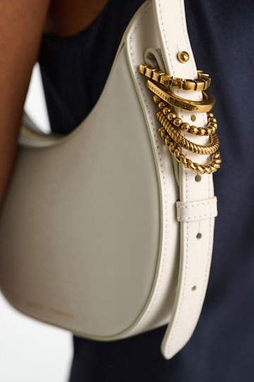 Dorothee Schumacher Half Moon Mini Bag in soft calf leather with D-ring hardware off white