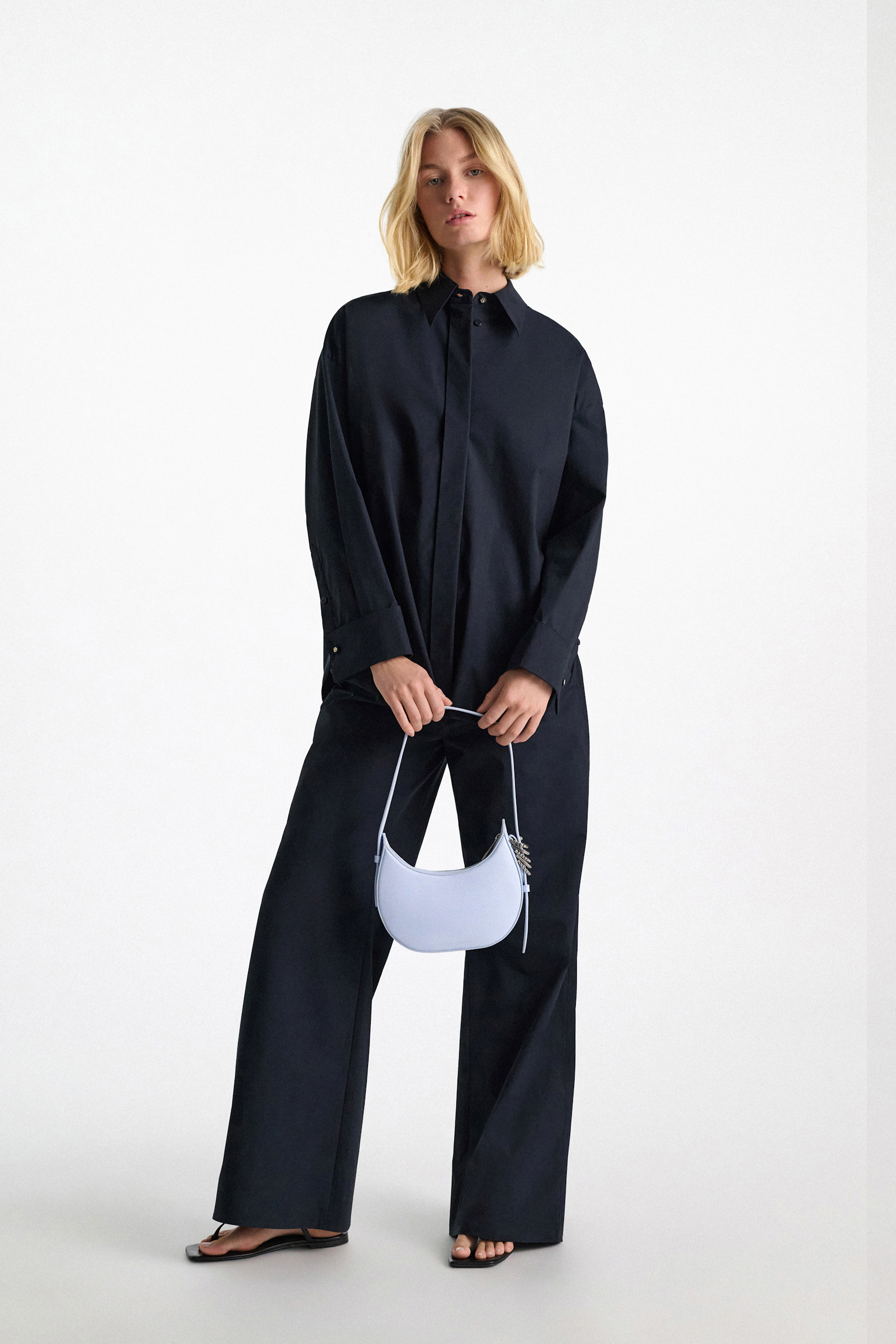 Dorothee Schumacher Half Moon Mini Bag in soft calf leather with D-ring hardware Baby Blue