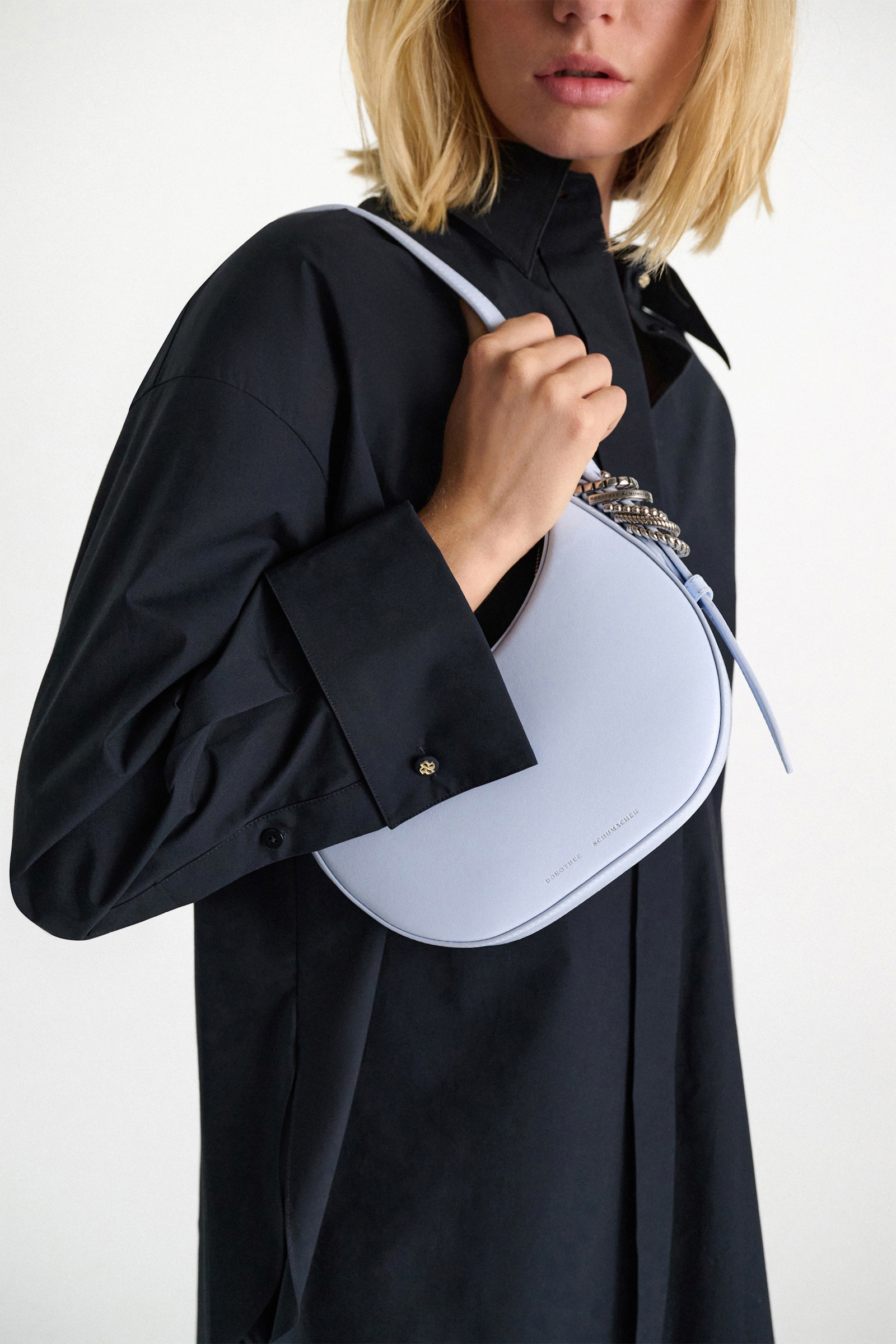 Dorothee Schumacher Half Moon Mini Bag in soft calf leather with D-ring hardware Baby Blue