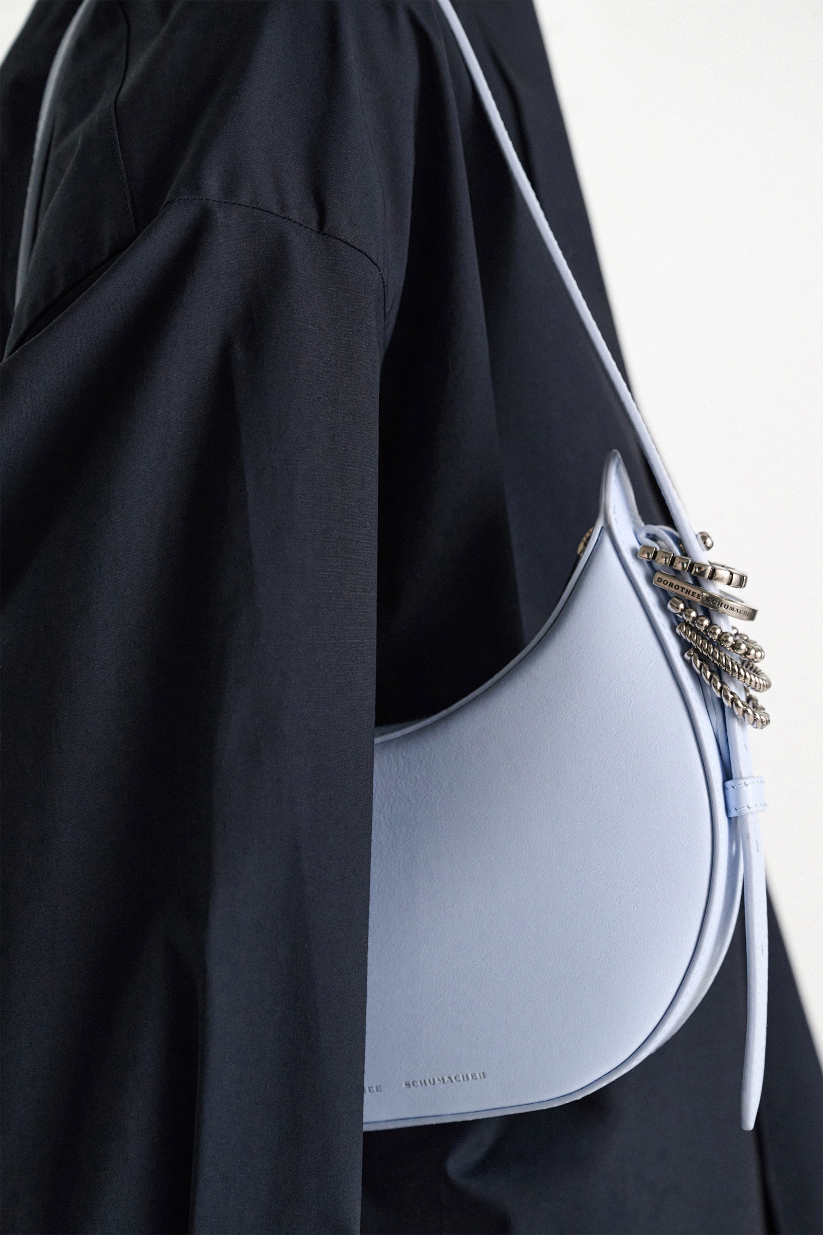 Dorothee Schumacher Half Moon Mini Bag in soft calf leather with D-ring hardware Baby Blue