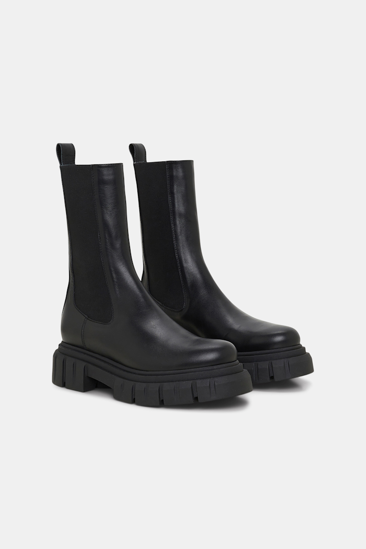 Dorothee Schumacher Leather Chelsea boots with chunky lug soles pure black