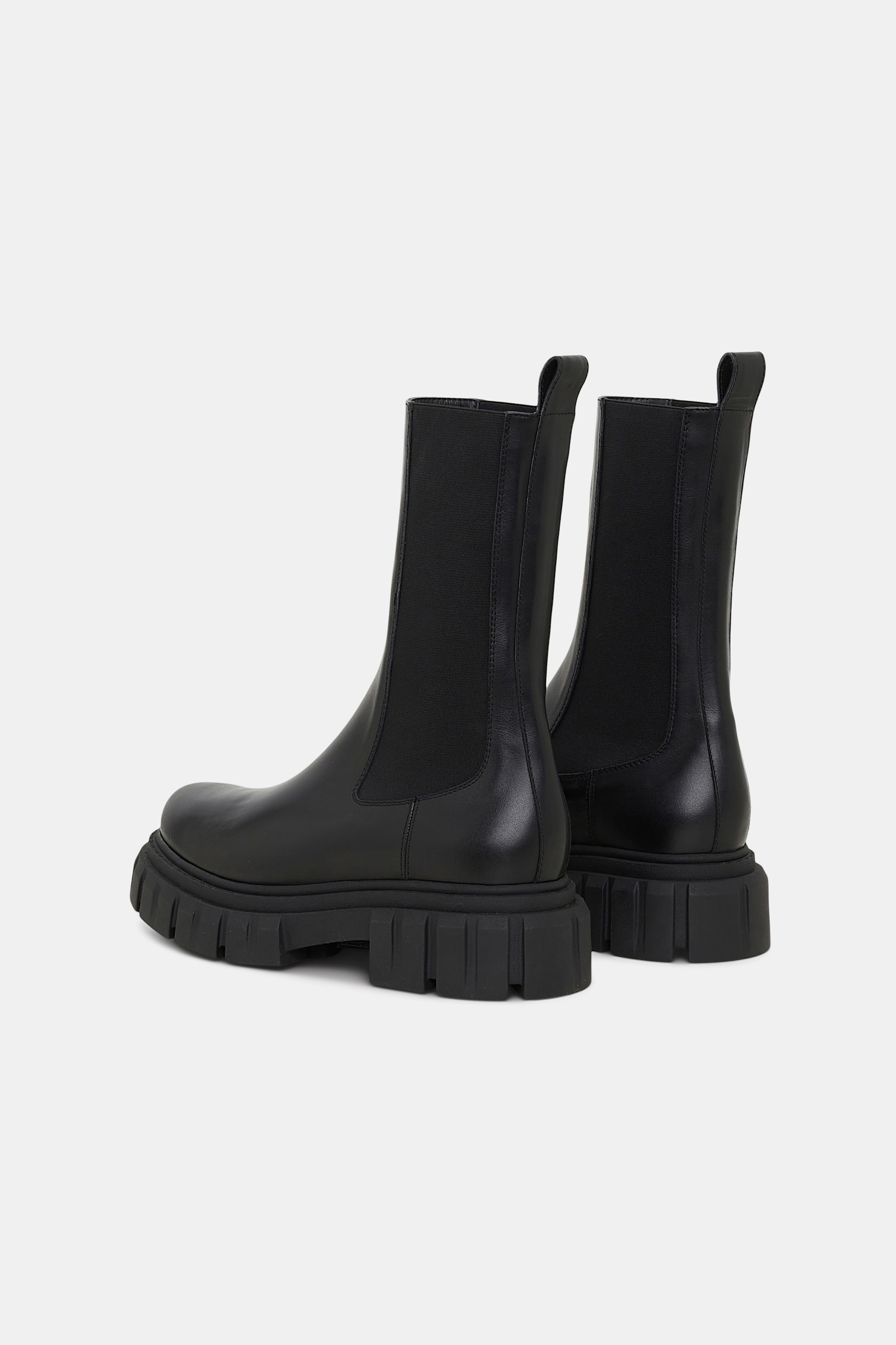 Dorothee Schumacher Leather Chelsea boots with chunky lug soles pure black