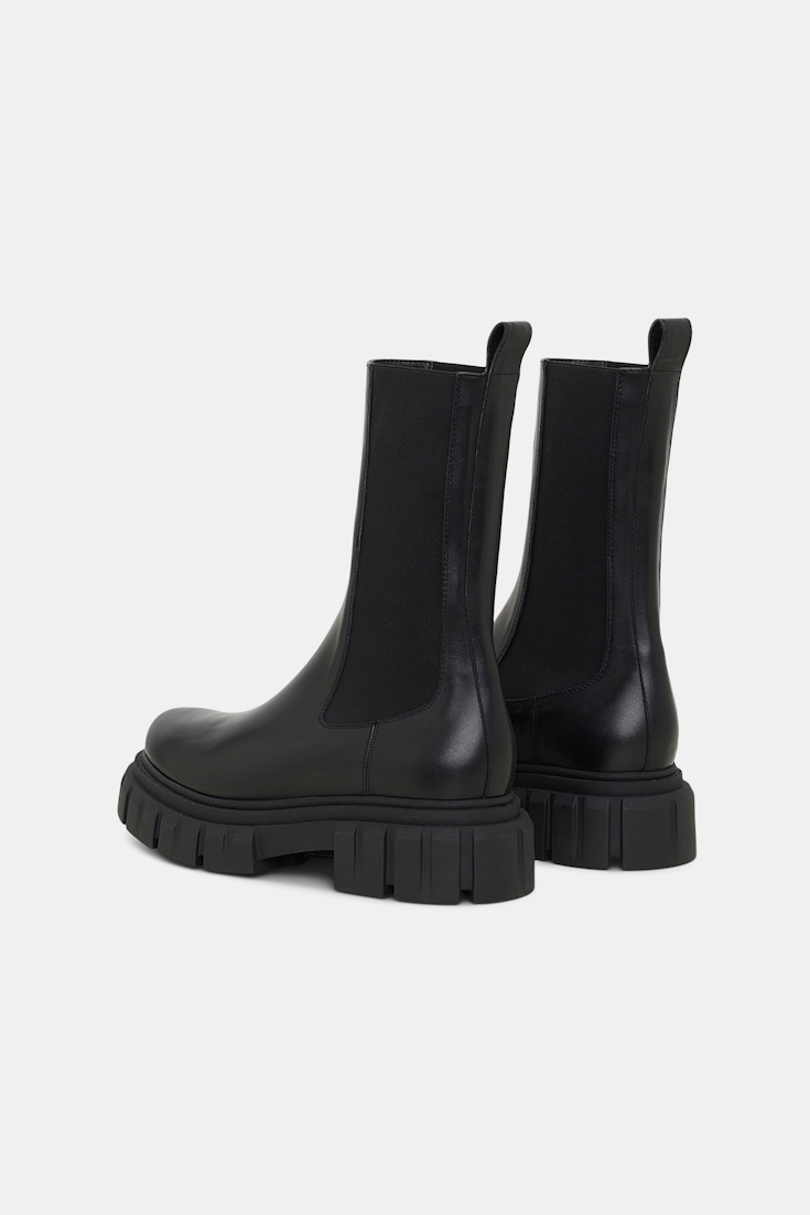 Dorothee Schumacher Leather Chelsea boots with chunky lug soles pure black